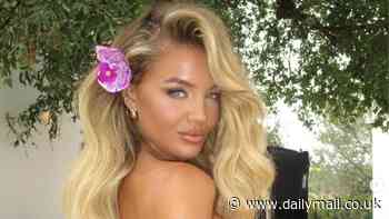 Love Island's Molly Smith stuns in a pretty floral dress during photoshoot in Portugal as she teases  something 'exciting' in the pipeline