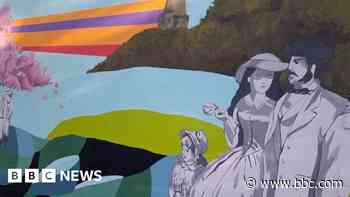 Residents paint mural in historic Railway Village
