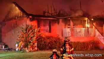 Fire rescue crews battle overnight blaze that destroyed home, displaced family