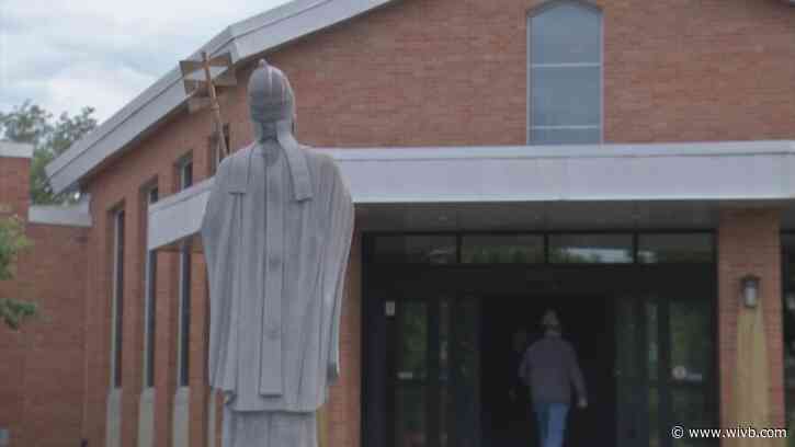 Rev. Bryan Zielenieski answers parishioner concerns during diocese restructuring