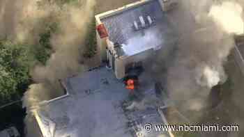 WATCH CHOPPER 6: Smoke billows as firefighters battle flames at Miami apartment building