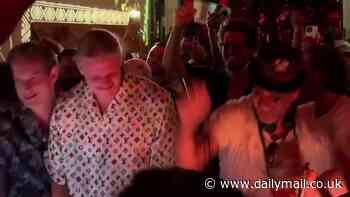 Erling Haaland lets his hair down to party in Ibiza in a £2,500 silk Louis Vuitton outfit, living it up by the DJ's decks after his nation Norway failed to qualify for the Euros, giving him the summer off