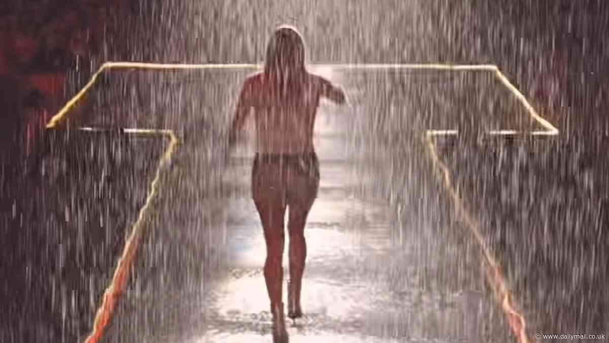 Carrie Underwood FALLS off stage after performing in downpour in new video: 'She fell!'