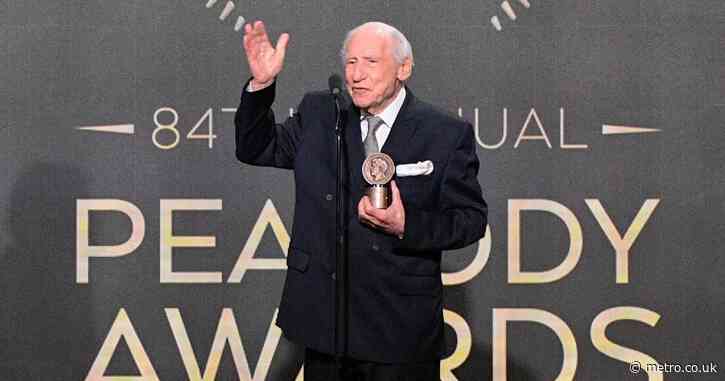 Hollywood legend, 97, looks sprightly in rare appearance as he receives major accolade
