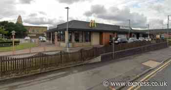 Woman rushed to hospital after setting herself on fire in UK McDonald's toilet