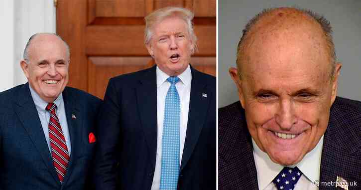 Donald Trump’s ex-lawyer Rudy Giuliani smirks in latest mugshot