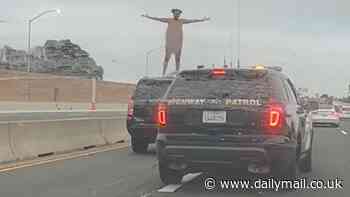 Wild moment woman strips naked on top of car in middle of California highway during police chase