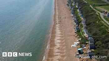 Removal of storm-damaged beach huts begins