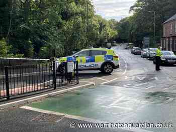 Police seal off busy road after incident overnight