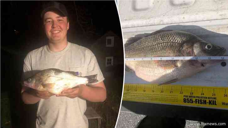 Teenager reels in record-breaking catch while out fishing with his dad