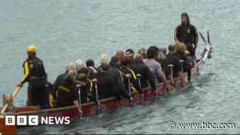 Dragon boats race in quays during festival