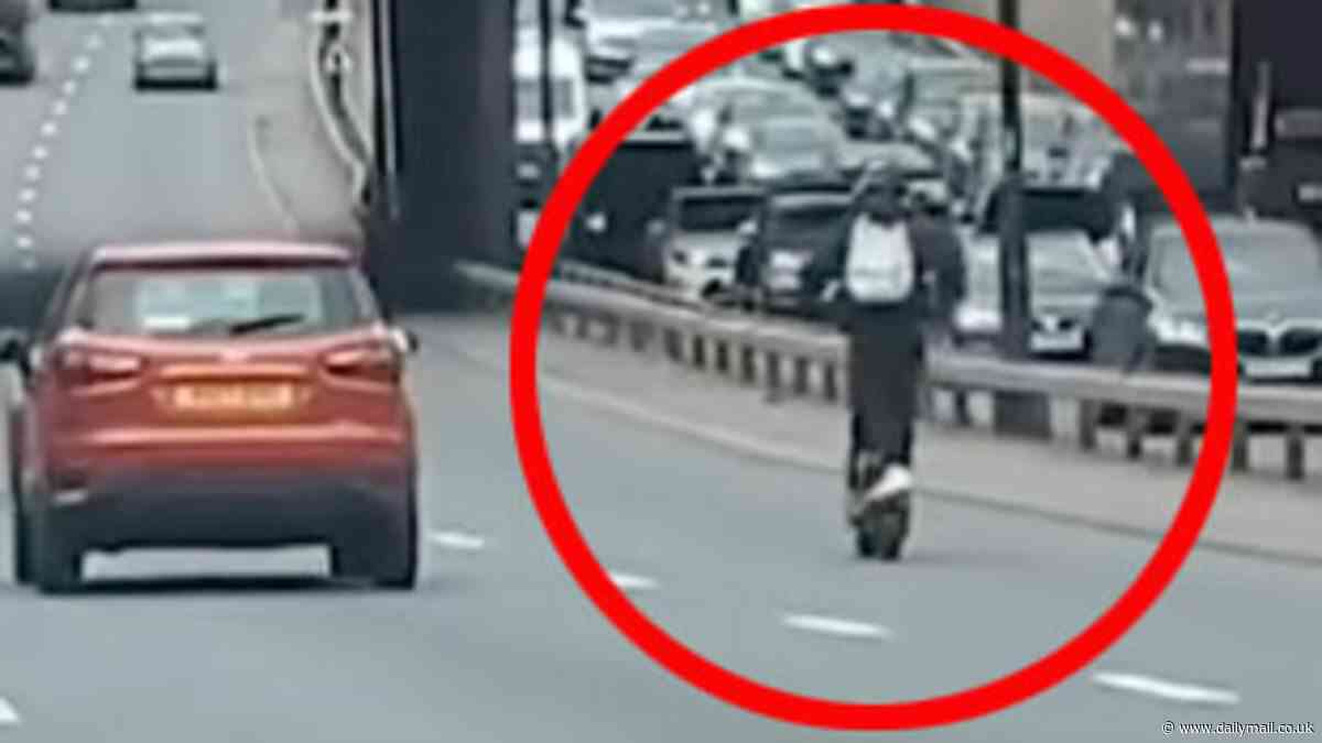 How reckless can you get? Moment e-scooter rider zooms along 40mph dual carriageway - even overtaking cars while whizzing along
