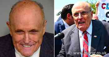 Rudy Giuliani grins in mugshot as Trump's ex-attorney faces election conspiracy charges