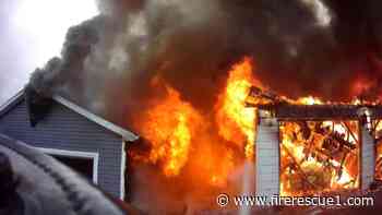 Roof collapse traps Pa. firefighters inside burning garage