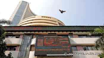 Sensex, Nifty Settle Almost Flat Amid Volatile Trade