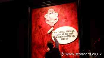 Animal rights protesters plaster King’s official portrait with Wallace and Gromit sticker