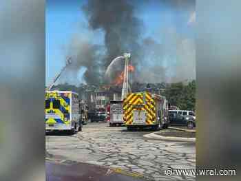 Crews respond to large fire at Spring Lake apartment