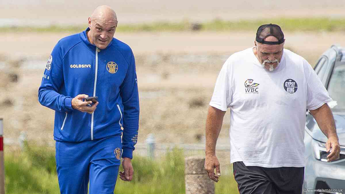 Tyson Fury is spotted out in Morecambe with his dad John for first time since footage emerged of the Gypsy King being escorted from a local bar - after 'enjoying one drink too many' in the aftermath of first ever defeat