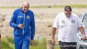 Tyson Fury is spotted out in Morecambe with his dad John for first time since footage emerged of the Gypsy King being escorted from a local bar - after 'enjoying one drink too many' in the aftermath of first ever defeat