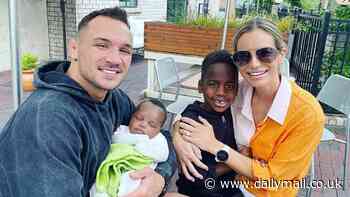 White UFC star Michael Chandler defends his and wife's decision to adopt two black children... after facing backlash over claims he's raising them not to see color