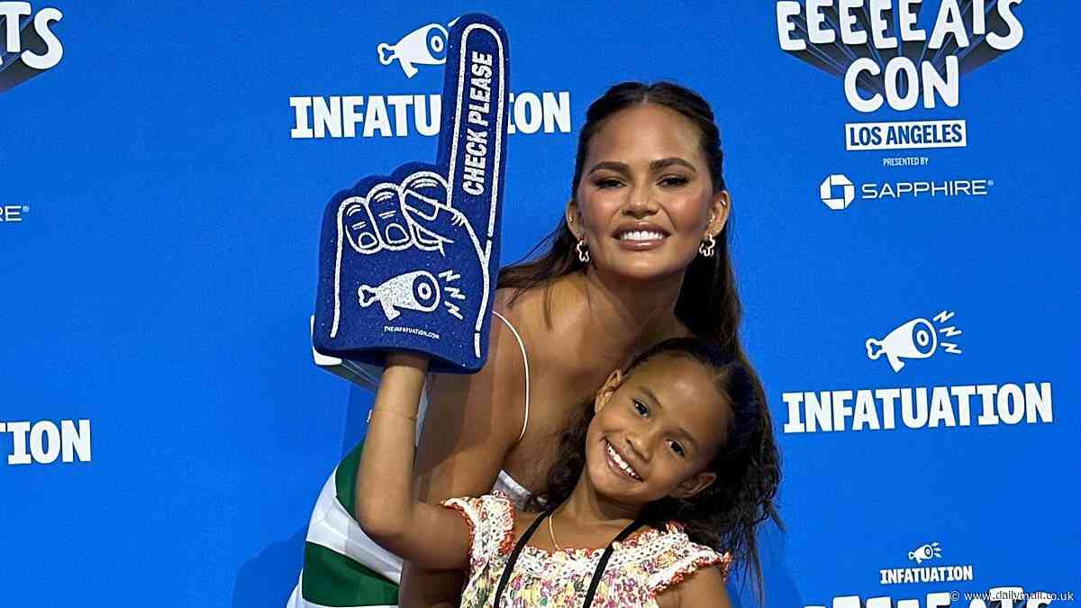 Chrissy Teigen introduces her daughter Luna, 8, to RuPaul's Drag Race queens at an event in LA