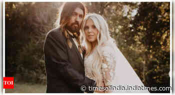Billy Ray Cyrus files for DIVORCE from Firerose