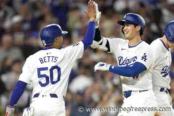 Dodgers blast 4 homers during 7-run 6th inning against Rangers
