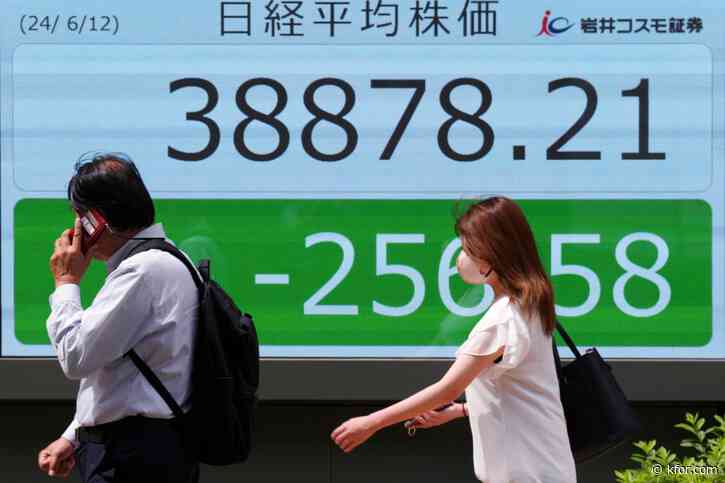 Stock market today: Asian shares are mostly lower ahead of Fed decision on interest rates