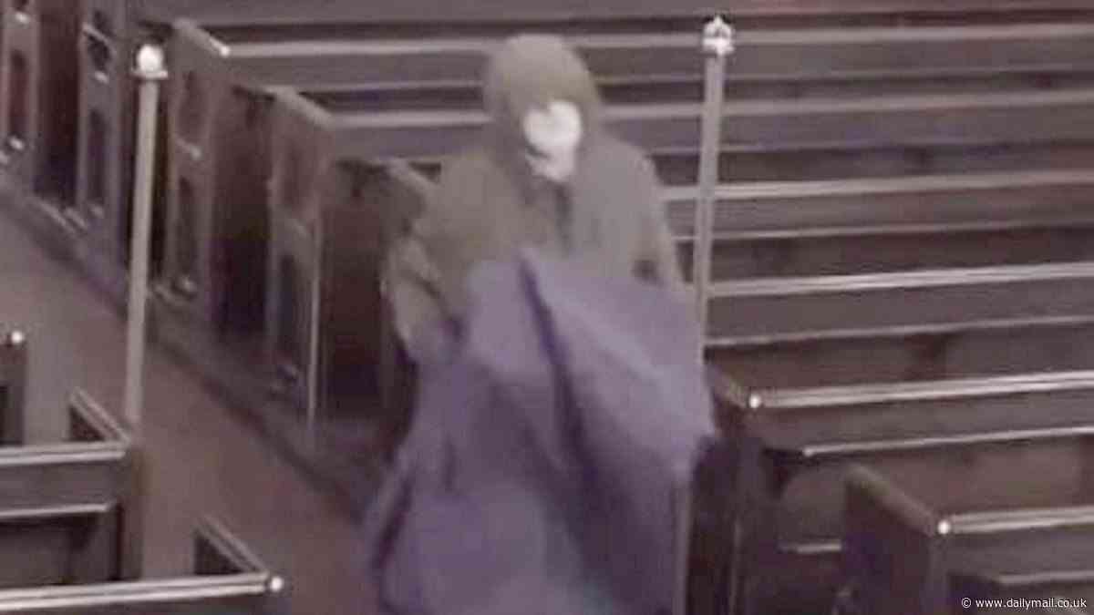 Moment shameless thief strolls into a deserted church and makes off with a £6000 brass eagle