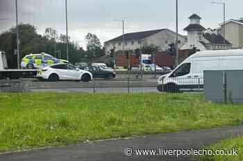 Live updates as East Lancs Road closed after police car flips in crash