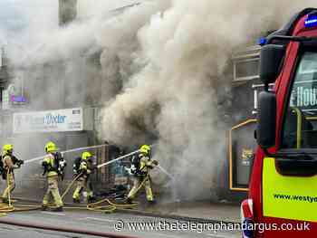 Leeds Road: Firefighters at Heaton Motor Factors blaze