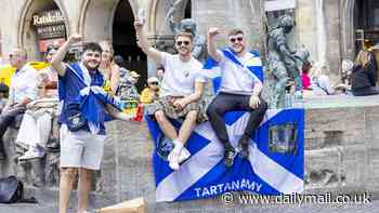 Tartan Army touch down in Munich! Legions of kilt-wearing Scotland fans arrive in Germany ahead of opening Euro 2024 clash