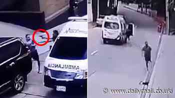 Shocking moment businessman is kidnapped by gunmen and then escapes by jumping out of ambulance
