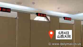 In a rush to flush: China installs timers above women's toilet cubicles at UNESCO site so fellow guests can tell how long they have been 'engaged'