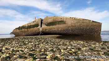 Mystery of huge abandoned concrete block known as 'The Cement Ship' sitting on eerie sandbar off coast is finally solved