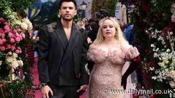 Nicola Coughlan steals the show in sequinned pink gown as she holds hands with her dapper onscreen lover Luke Newton at Bridgerton's Season Three Part II premiere in London