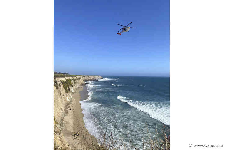 LOOK: Kite surfer rescued from remote California beach after making 'HELP' sign with rocks