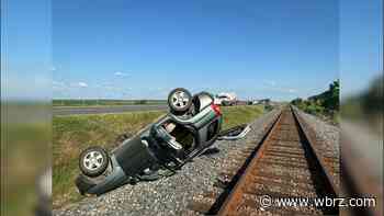 Two vehicles overturn by railroad track on Morganza Spillway; no major injuries