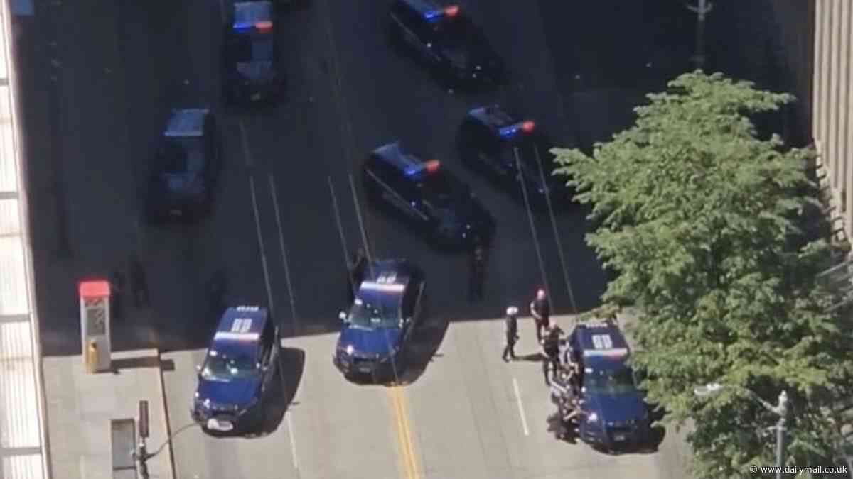 Police swarm FBI headquarters in Seattle as woman with a gun storms building