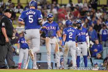 Seager hits 3-run homer in return to Dodger Stadium, Rangers win 3-2 as Pages thrown out at plate