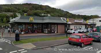 A 53-year-old man headbutted a young teenager in McDonald's then had to be restrained from going at him again