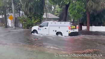 Miami residents wade through torrential rain amid warnings of ‘life-threatening flooding’