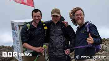 Thousands raised by fridge trek up mountain