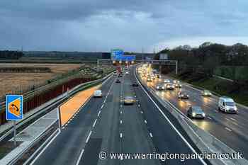 Long queues and delays on M6 northbound in Warrington
