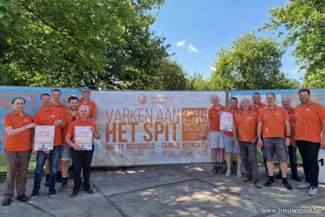 Landelijke Gilde Vlezenbeek maakt varken aan het spit