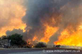 Wildfire claims 6 homes near Arizona town, shuts Phoenix-to-Las Vegas highway