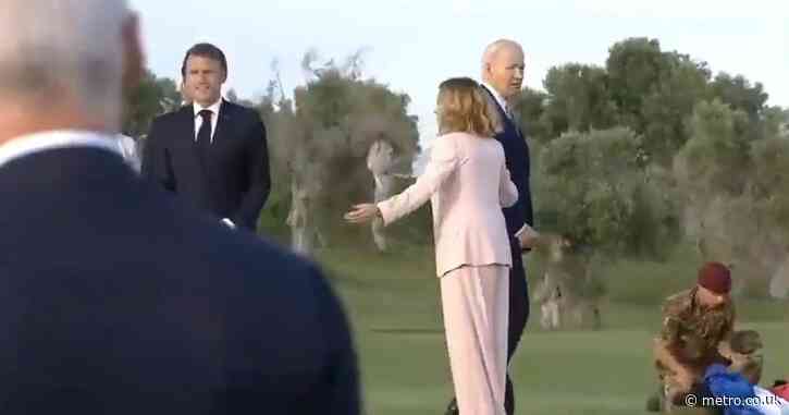 Italian PM forced to pull back Joe Biden as he wanders off at G7