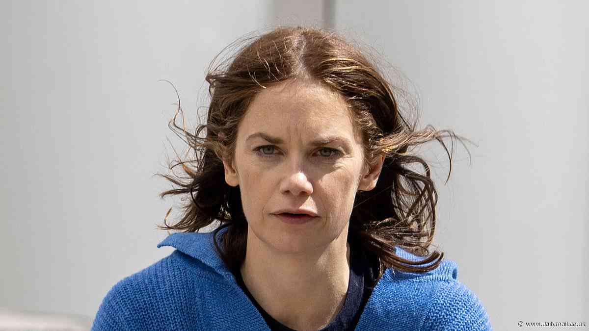 Ruth Wilson seen on the set of new Apple TV+ series Down Cemetery Road for the first time as she rides a bicycle through Bristol while filming