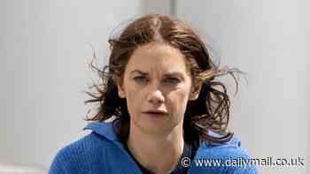 Ruth Wilson seen on the set of new Apple TV+ series Down Cemetery Road for the first time as she rides a bicycle through Bristol while filming