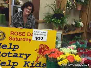 Rotary Rose Day brings smiles and helps kids